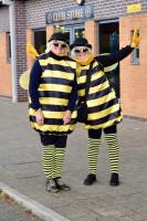 Busy Bee Rotarians collecting donations from the crowd.